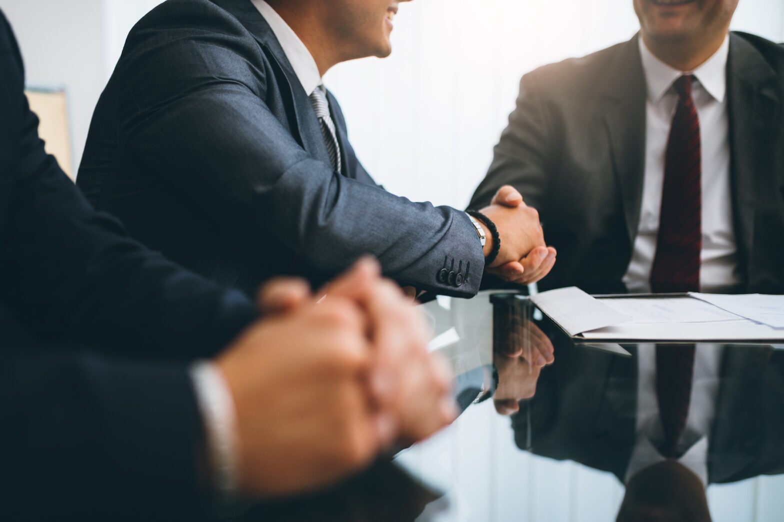 Personal injury lawyer in Louisiana shaking hands with client